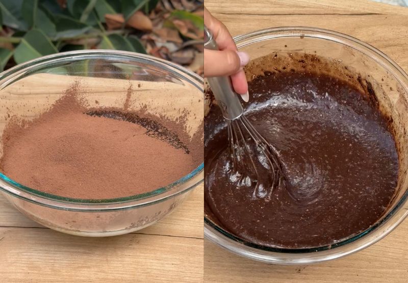 Wet ingredients mixed in a bowl for double chocolate muffins.