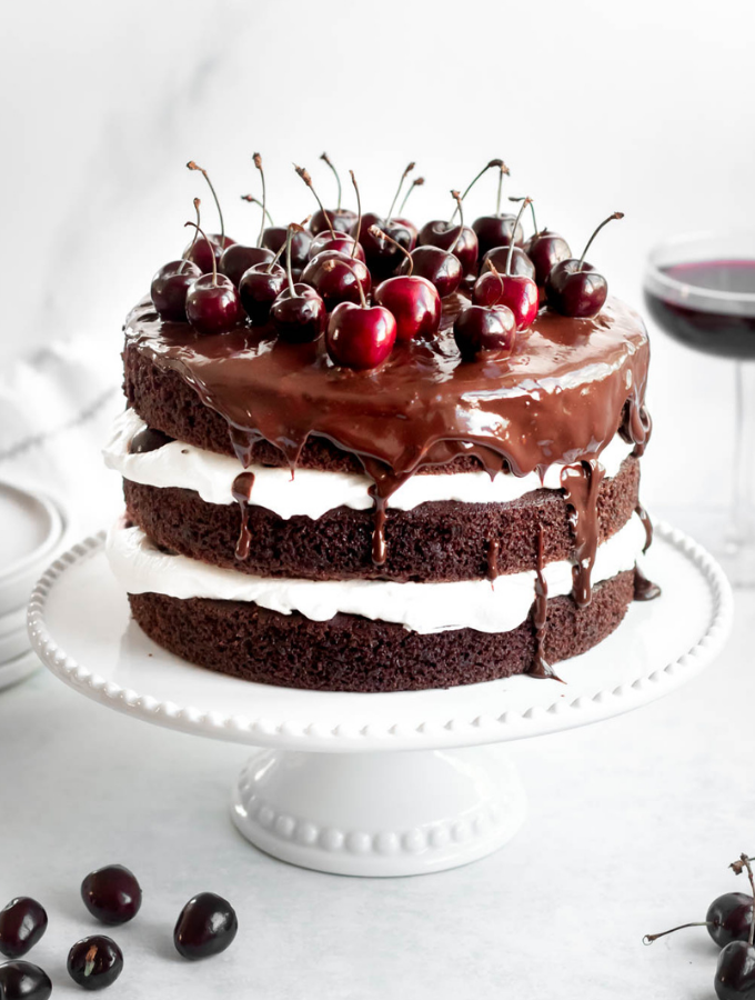 Black forest cake on a cake plate.