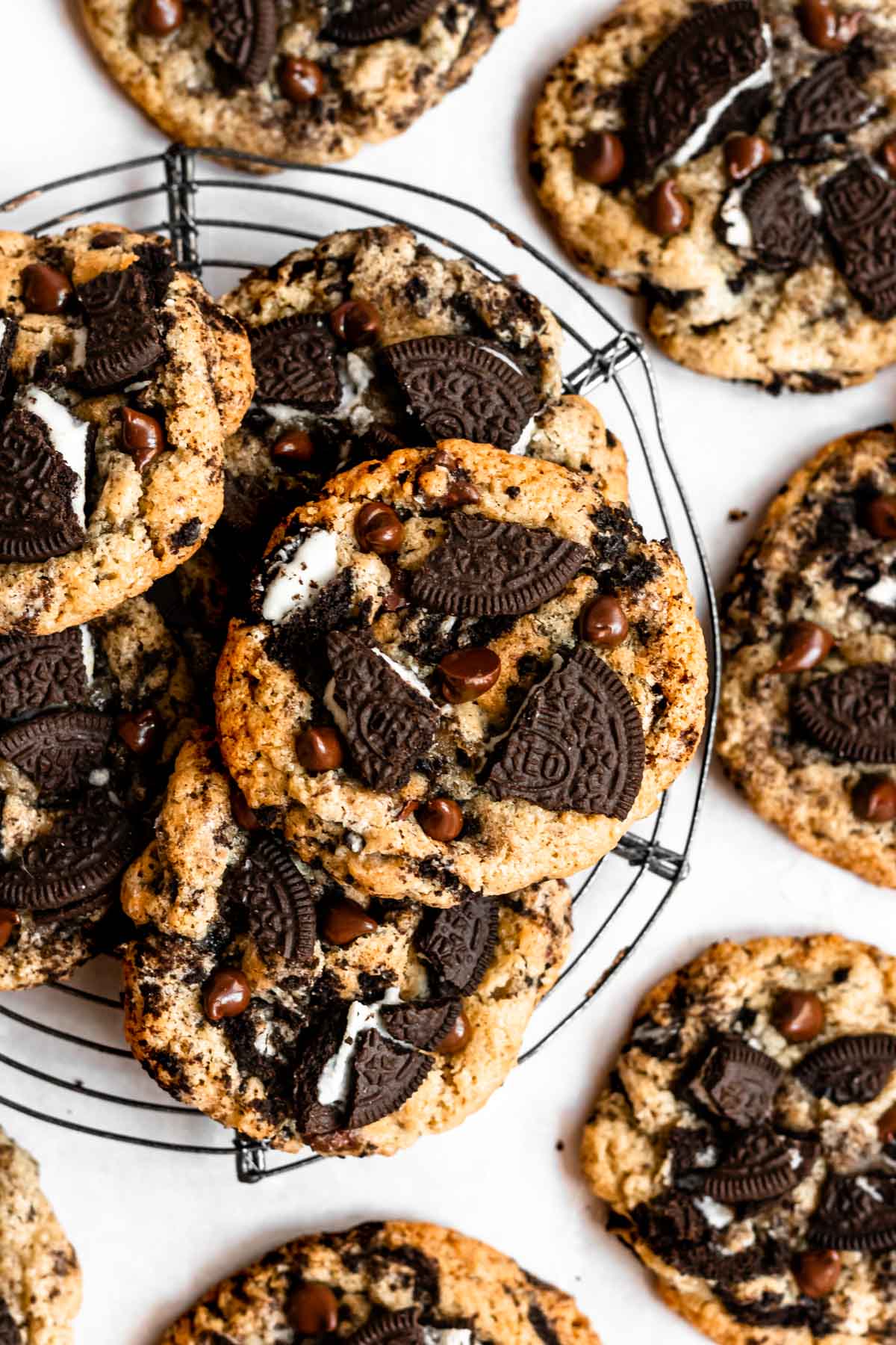 Oreo chocolate chip cookies on a cooling rack.