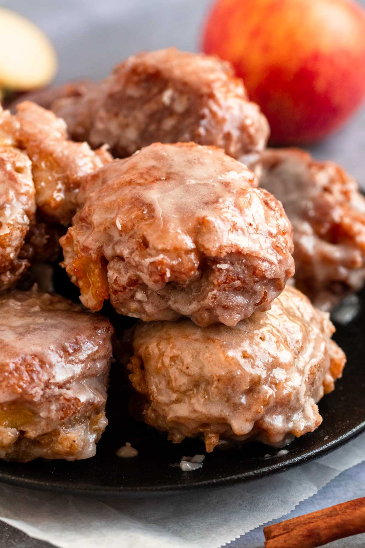 Apple fritters on a plate.