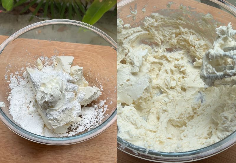 An electric hand mixer beating smooth cream cheese, powdered sugar, and vanilla extract in a large white bowl.