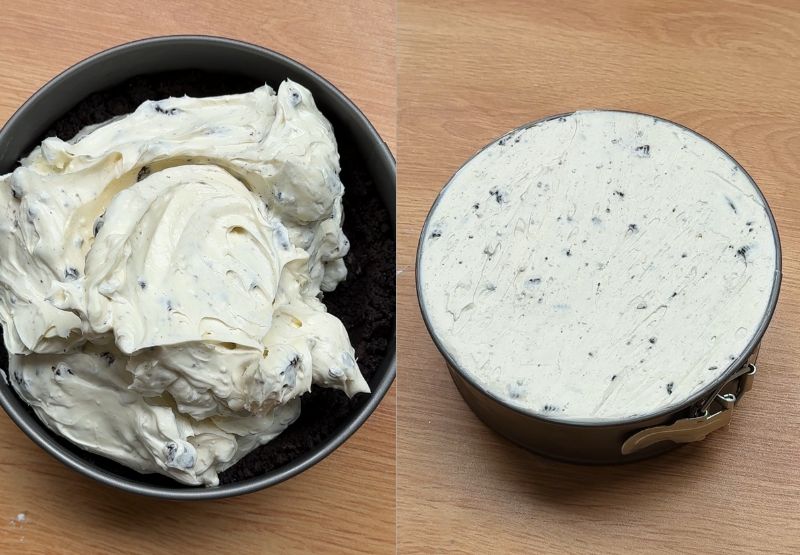 Pouring the thick Oreo cheesecake filling over the cookie crust in a silver springform pan.