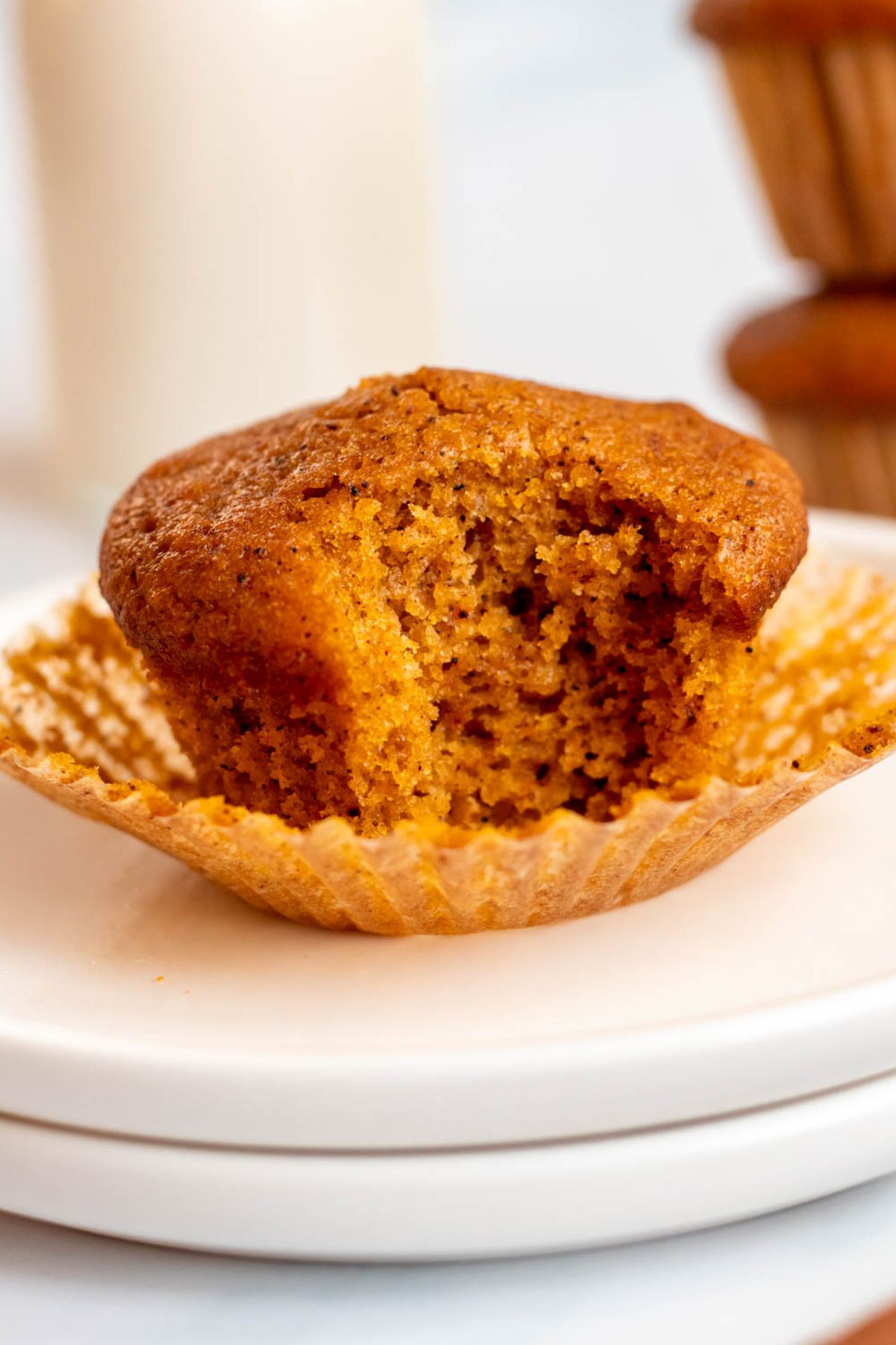 Bite missing from a muffin.