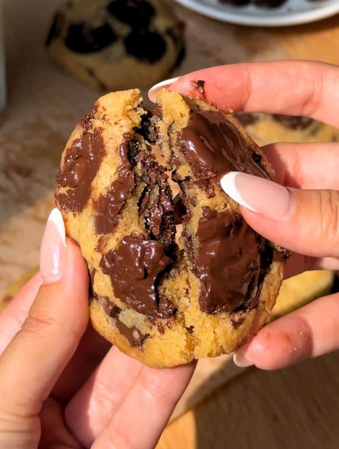 Small batch chocolate chip cookie cut in half.