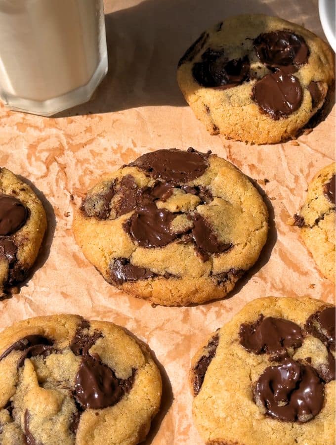 Small batch chocolate chip cookies on a brown parchment paper.
