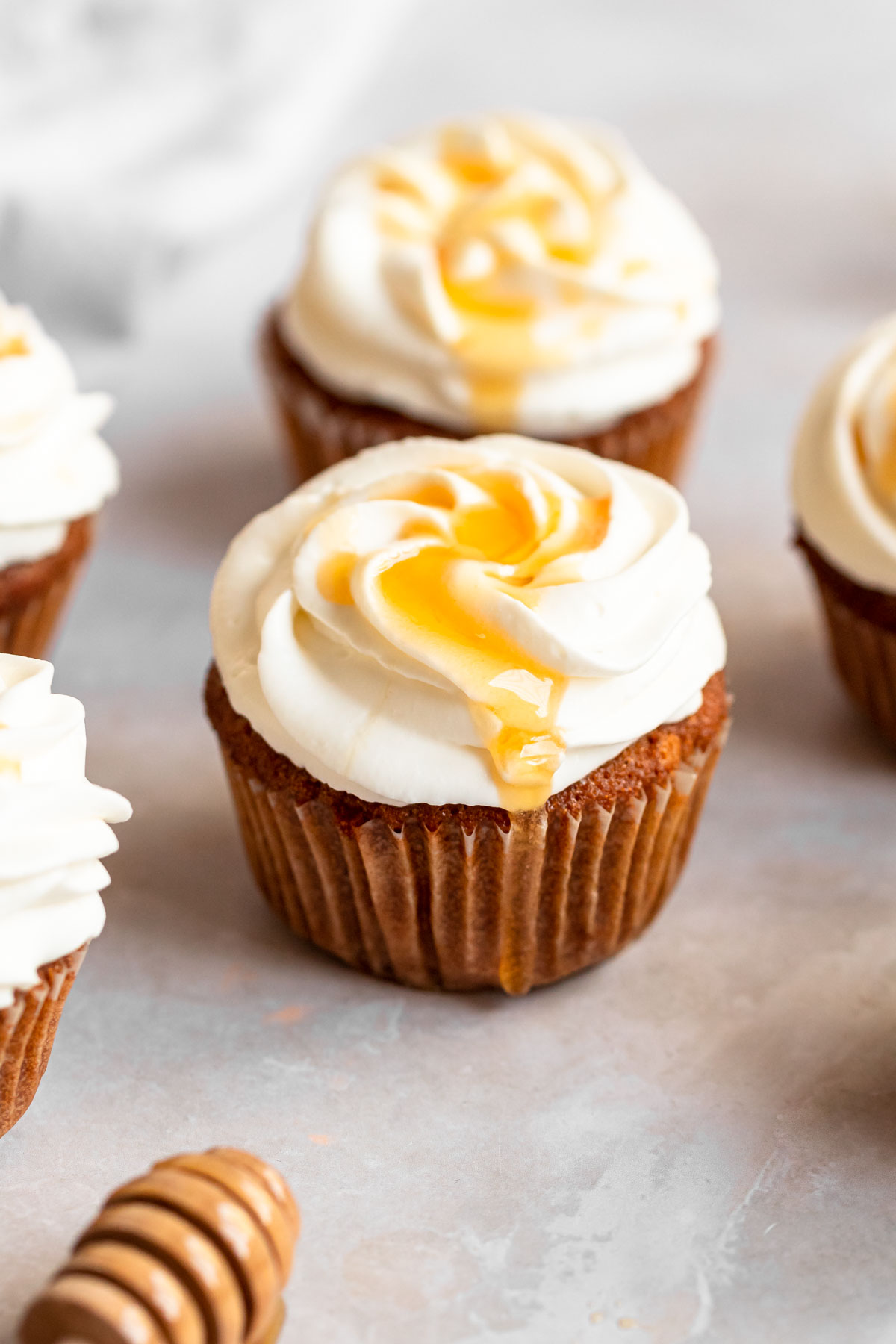 Honey dripping from cupcakes.