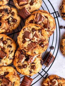 Overhead shot of kinder bueno cookies on a round black cooling rack.