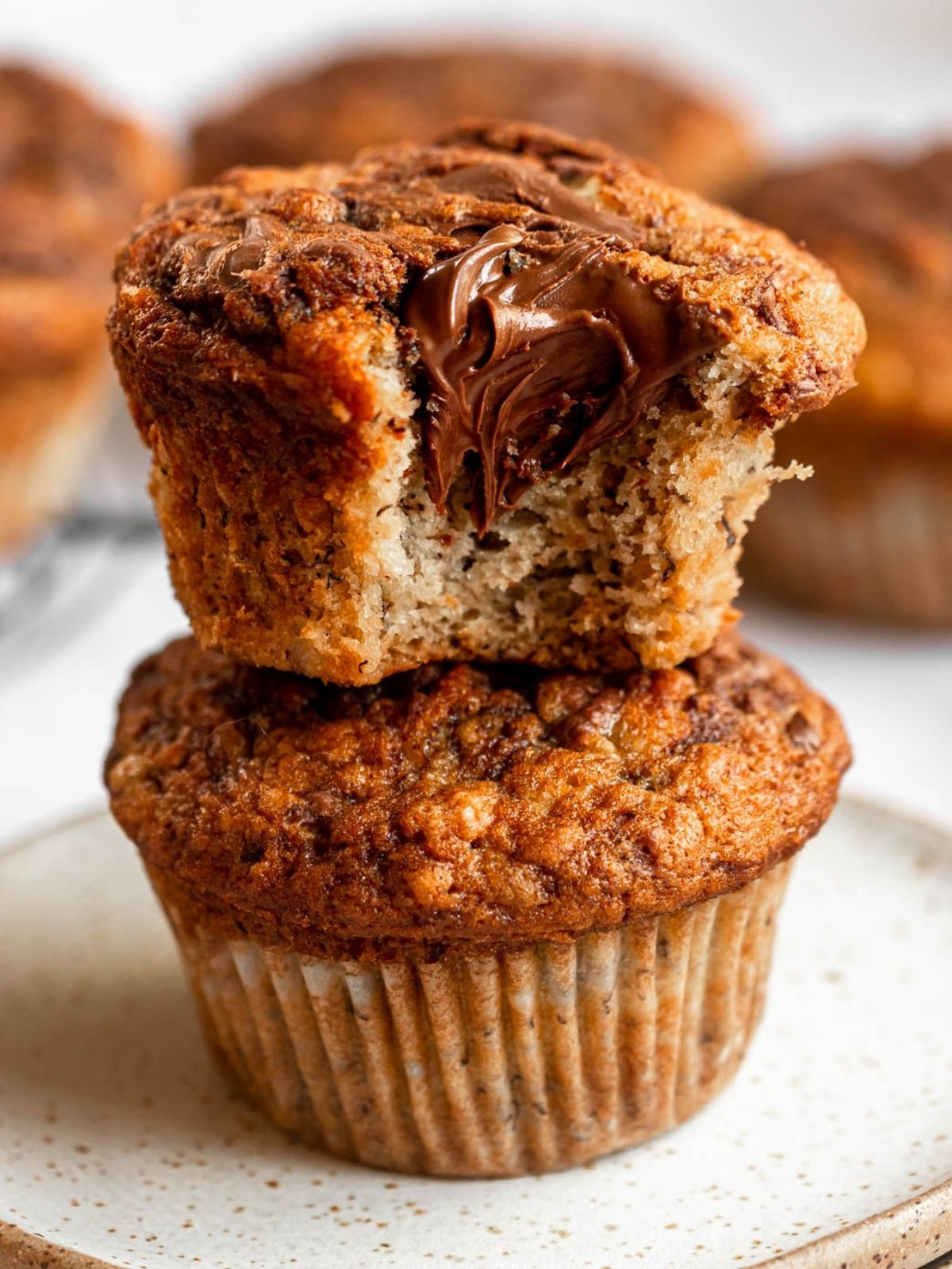 Bite missing from nutella swirl banana muffins.