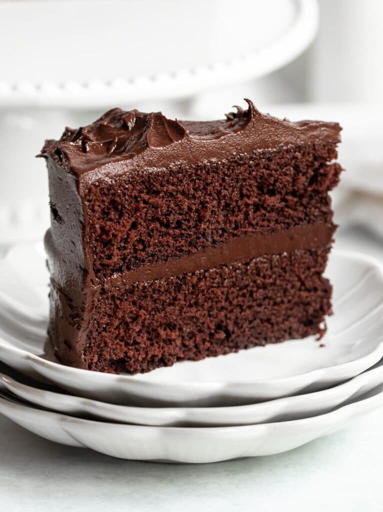 Slice of chocolate cake on a plate.