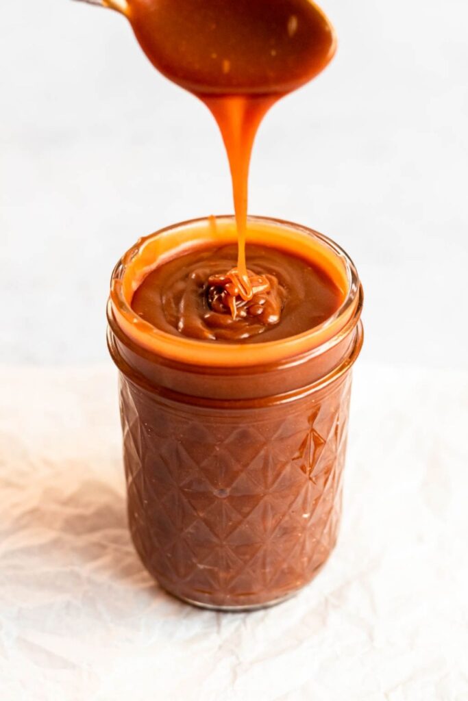 Salted caramel sauce in a mason jar.