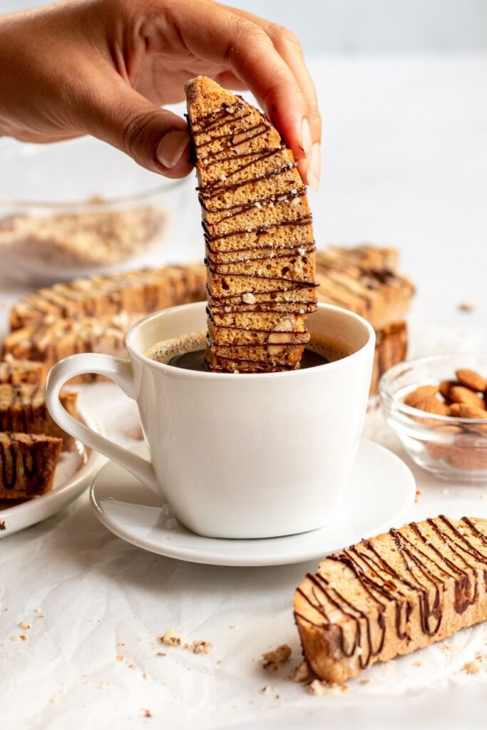 Almond biscotti dipped in a cup of coffee.