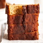 Bite missing from a slice of banana bread without baking soda.