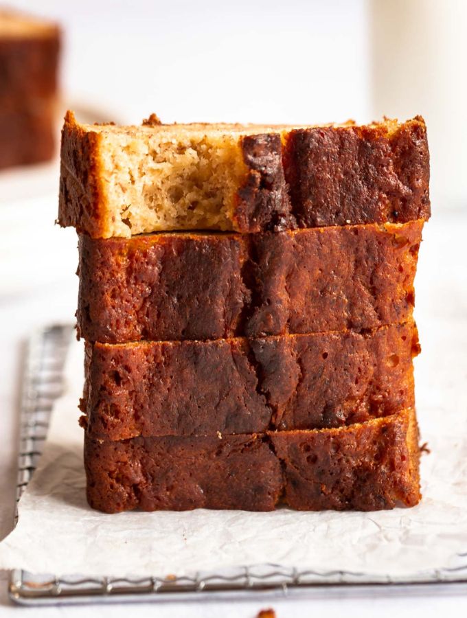 Bite missing from a slice of banana bread without baking soda.