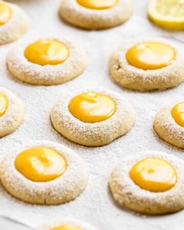 Lemon curd cookies with powdered sugar on top.