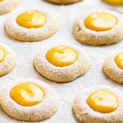 Lemon curd cookies with powdered sugar on top.