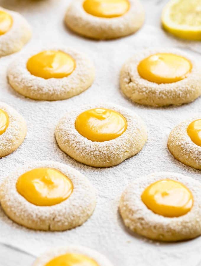 Lemon curd cookies with powdered sugar on top.