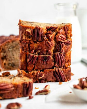 Stack of slices of pecan banana bread.