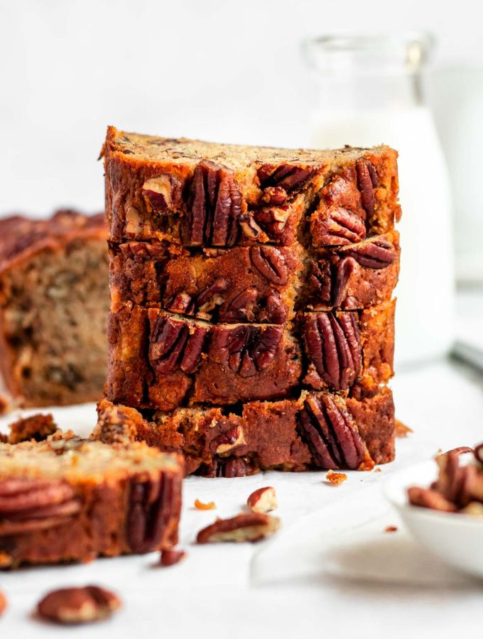 Stack of slices of pecan banana bread.