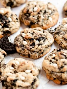 Close up shot of cookies and cream cookies on a parchment paper.