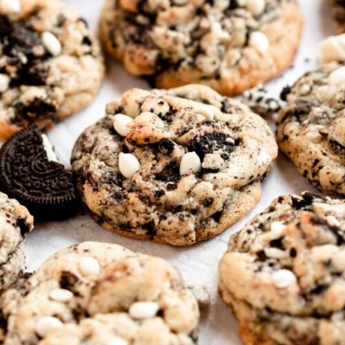 Close up shot of cookies and cream cookies on a parchment paper.