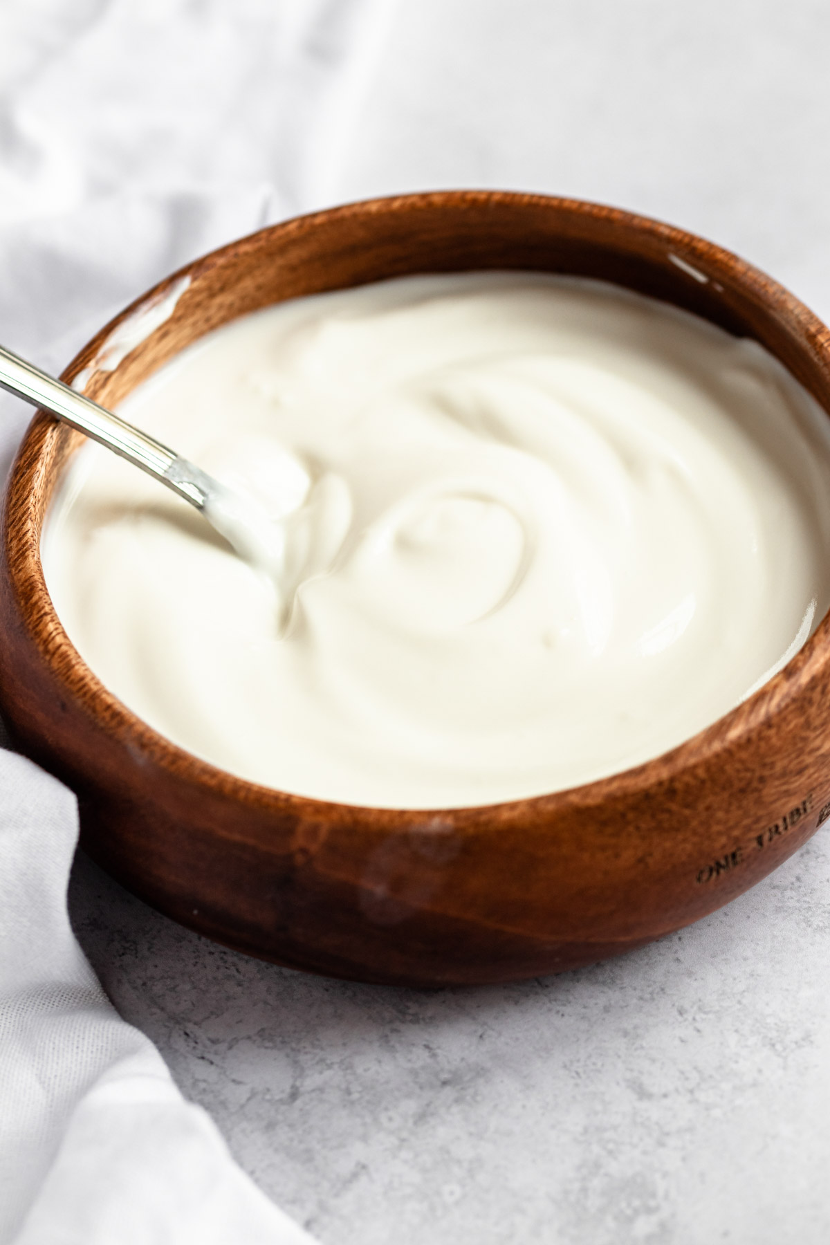 Close up shot of greek yogurt in a bowl.