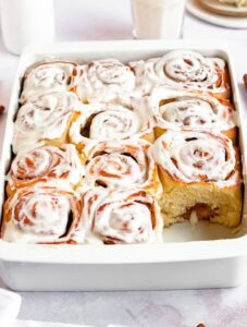 Close up shot of homemade cinnamon rolls in a pan.