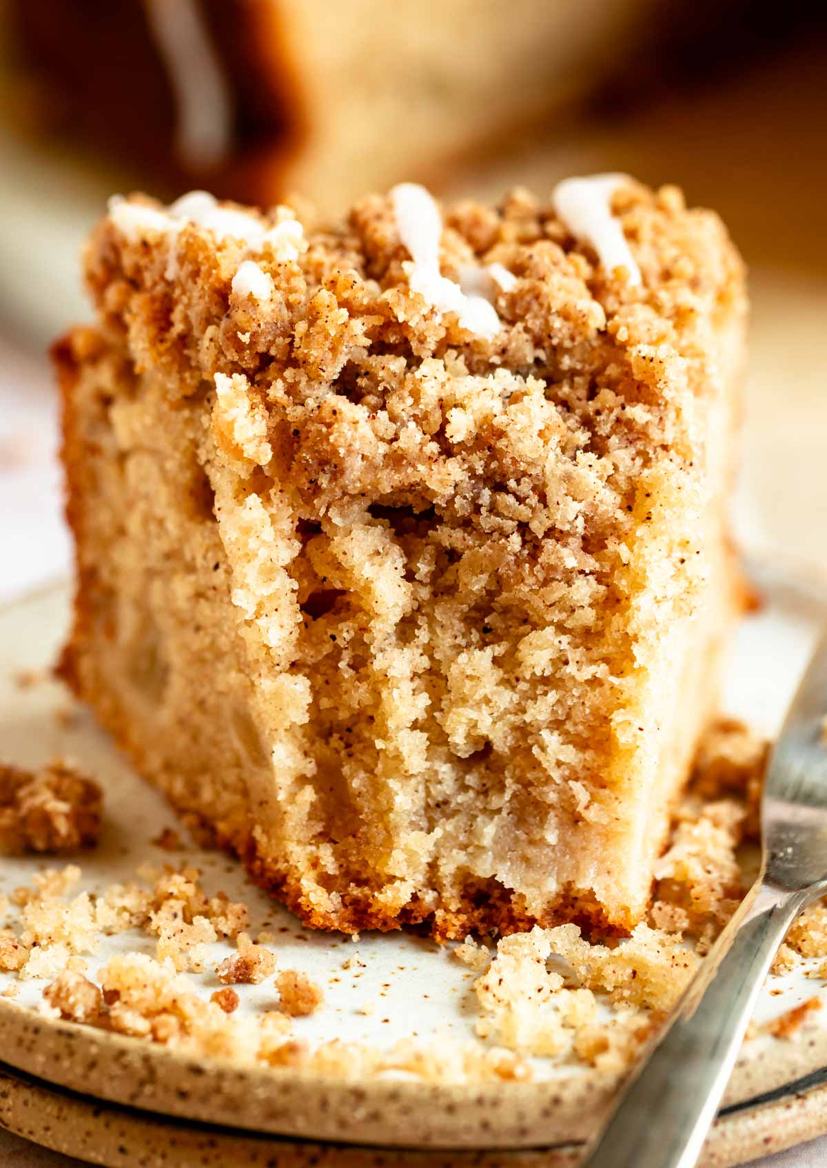 Close up shot of a slice of cake with a bite missing.