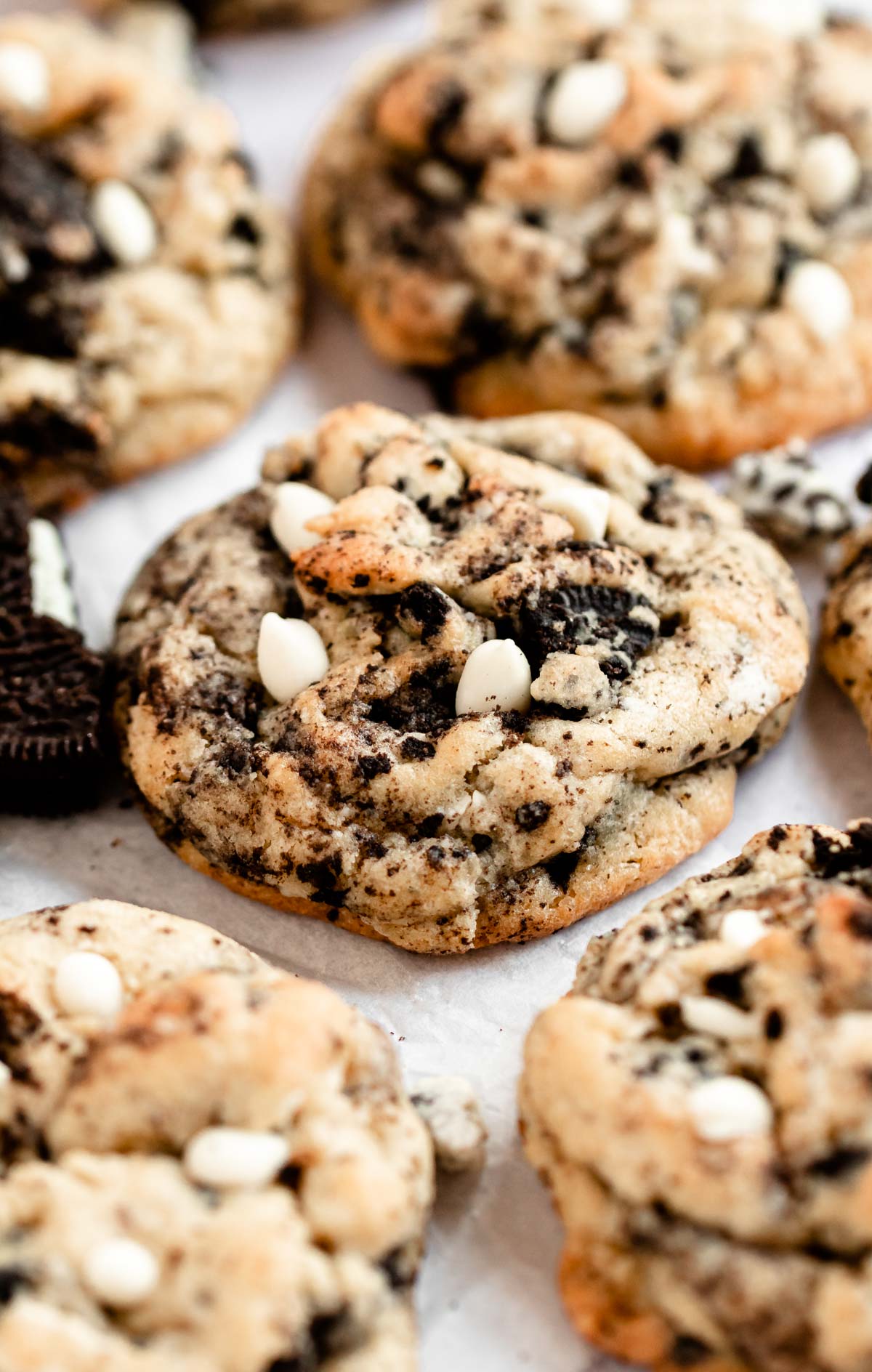 Close up shot of cookies and cream cookies on a parchment paper.