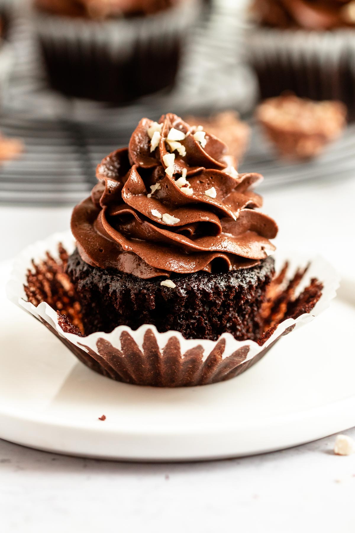 Cupcake on a white plate.