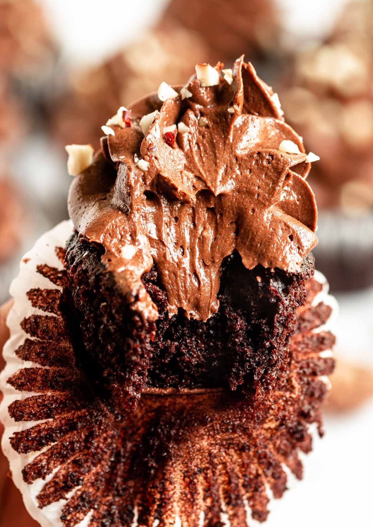 Bite missing from a nutella cupcake.