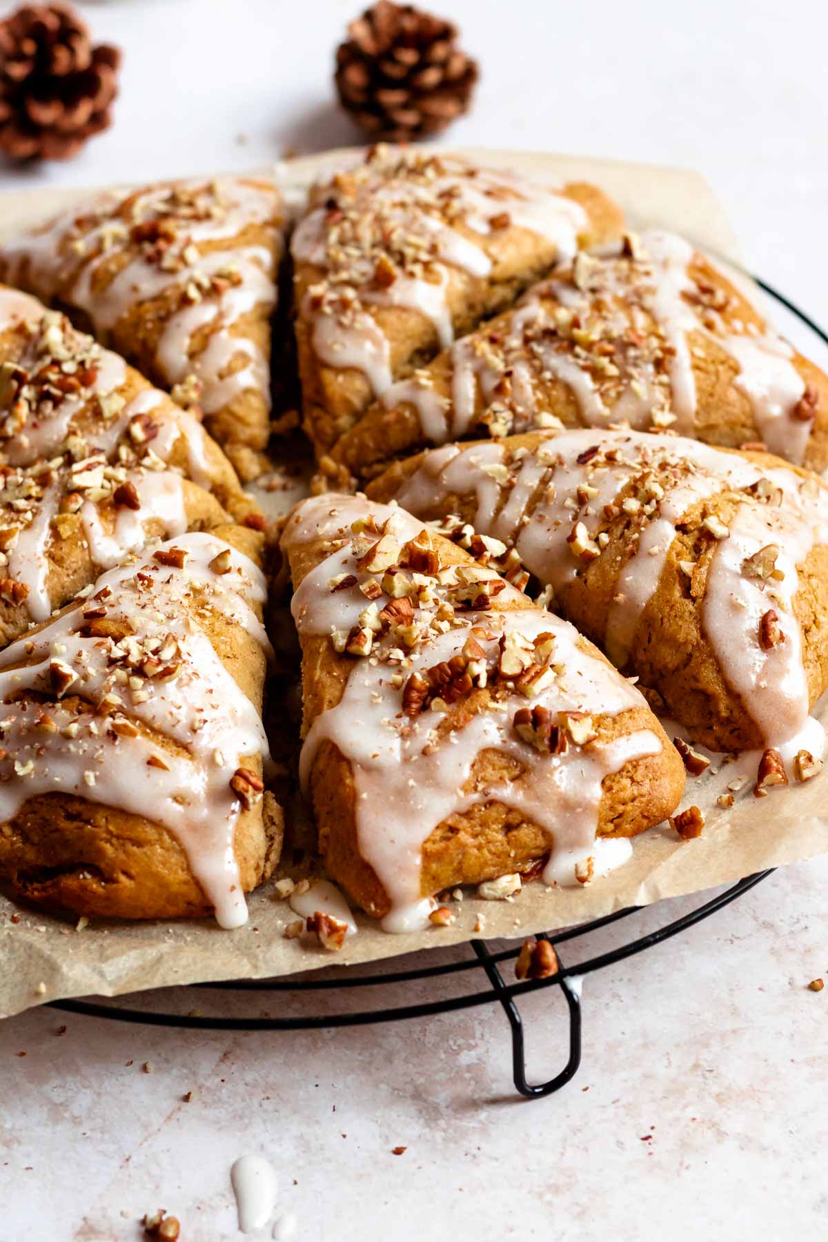 Pumpkin scones on a cooling rack.