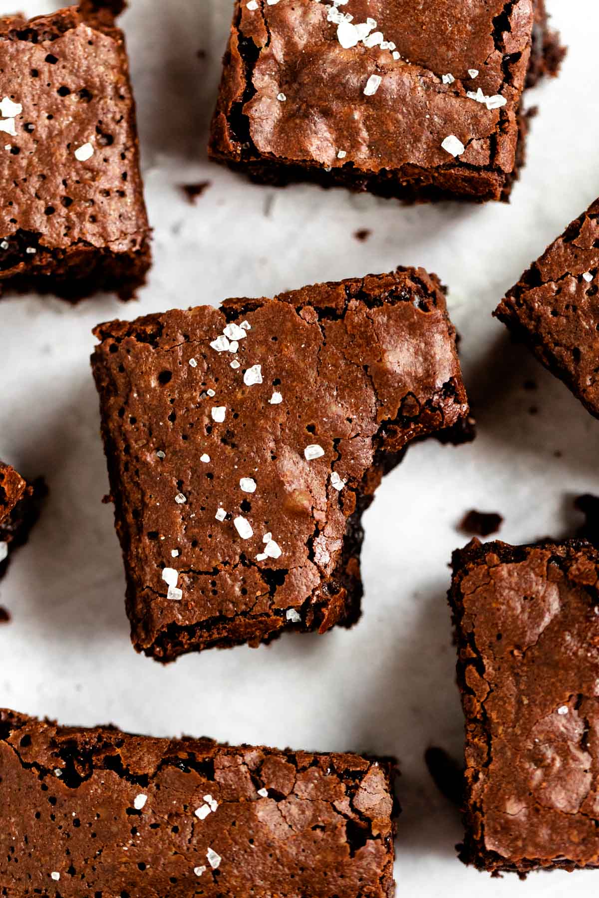 Overhead shot of brownies with a bite missing.