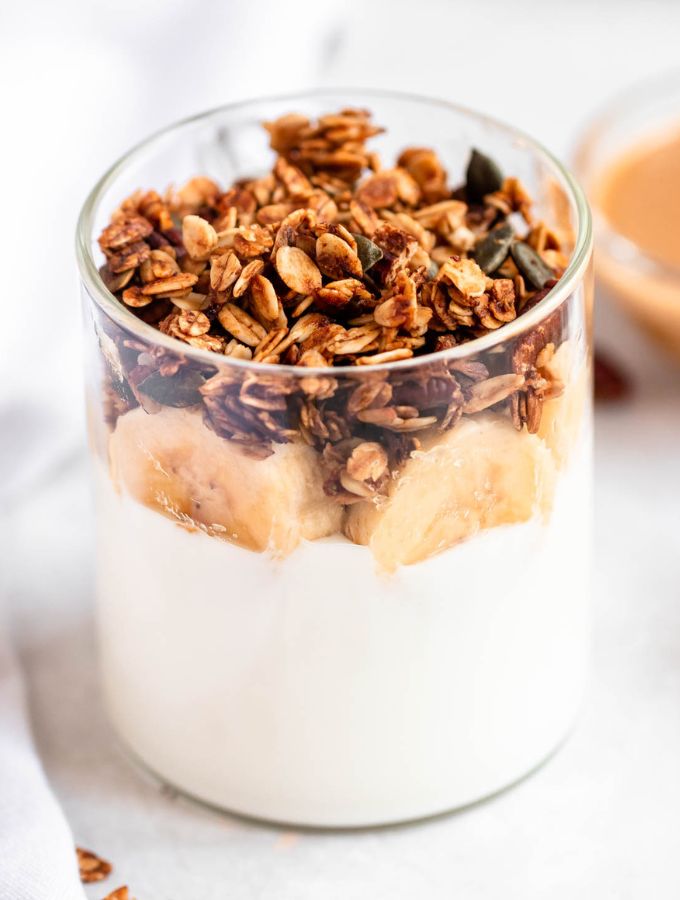 Close up shot of gluten free granola in a cup.