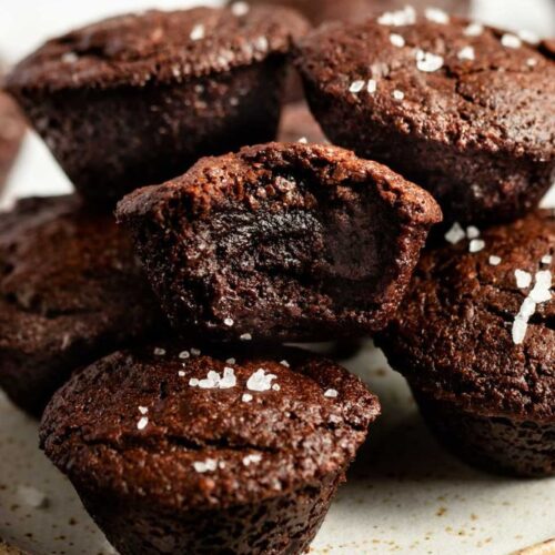 Stack of mini brownie bites with a bite missing from the middle one.