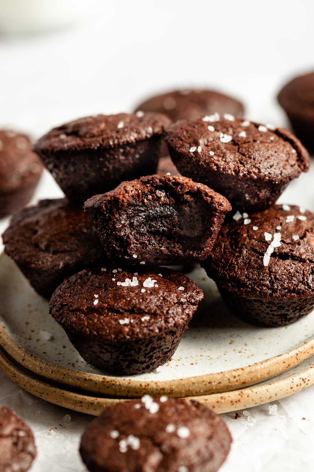 Stack of mini brownie bites with a bite missing from the middle one.