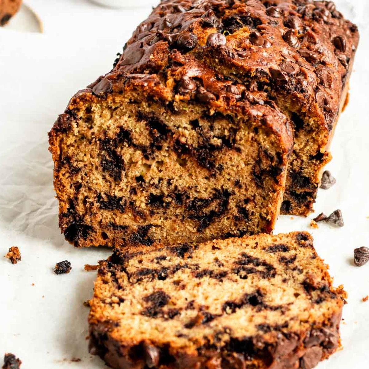 Sliced loaf of chocolate chip zucchini bread.