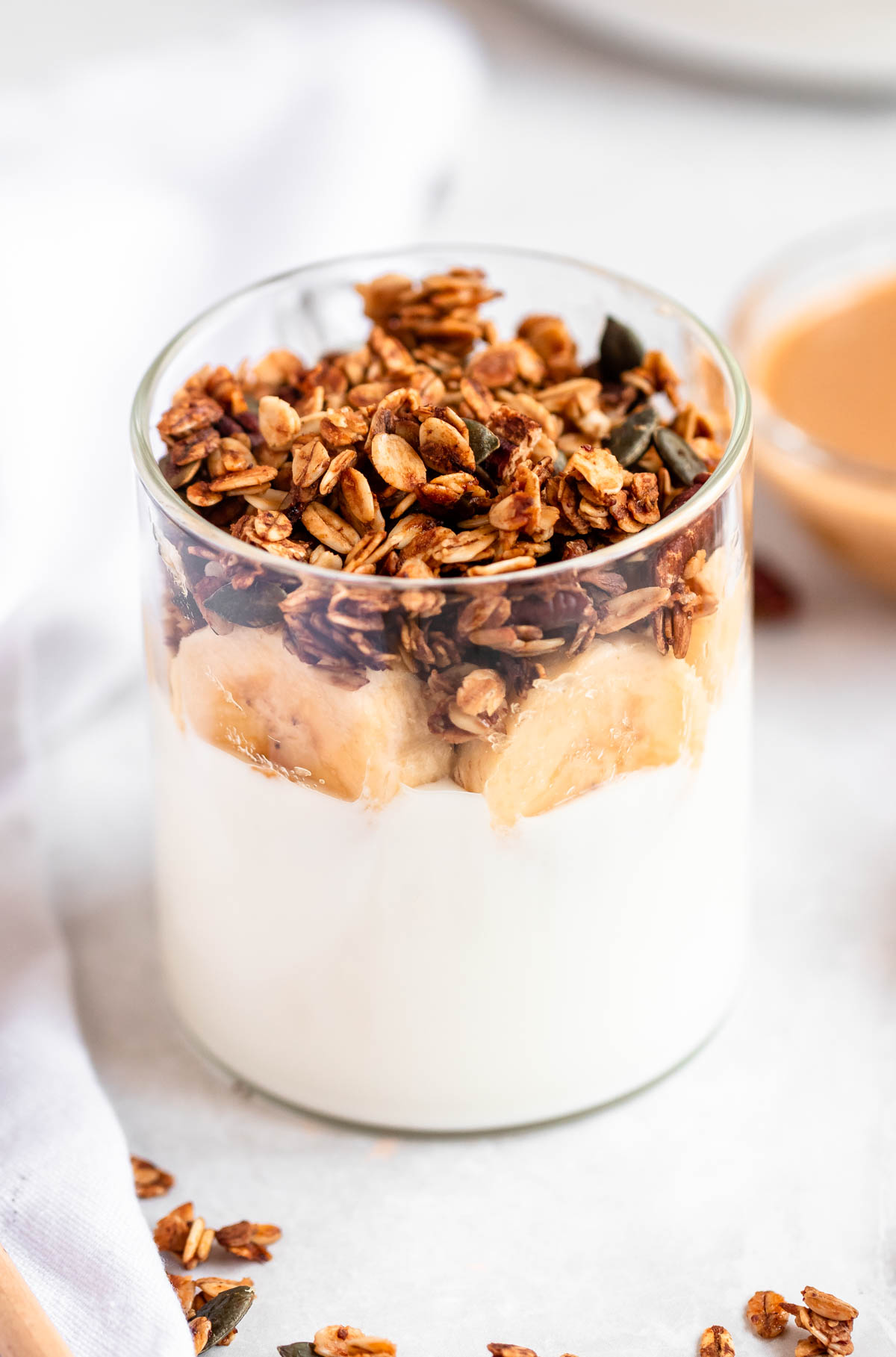 Close up shot of gluten free granola in a cup.