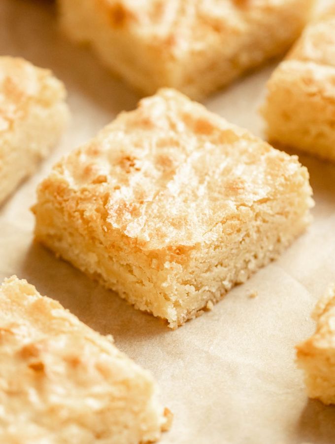 Close up shot of a piece of white chocolate brownies.