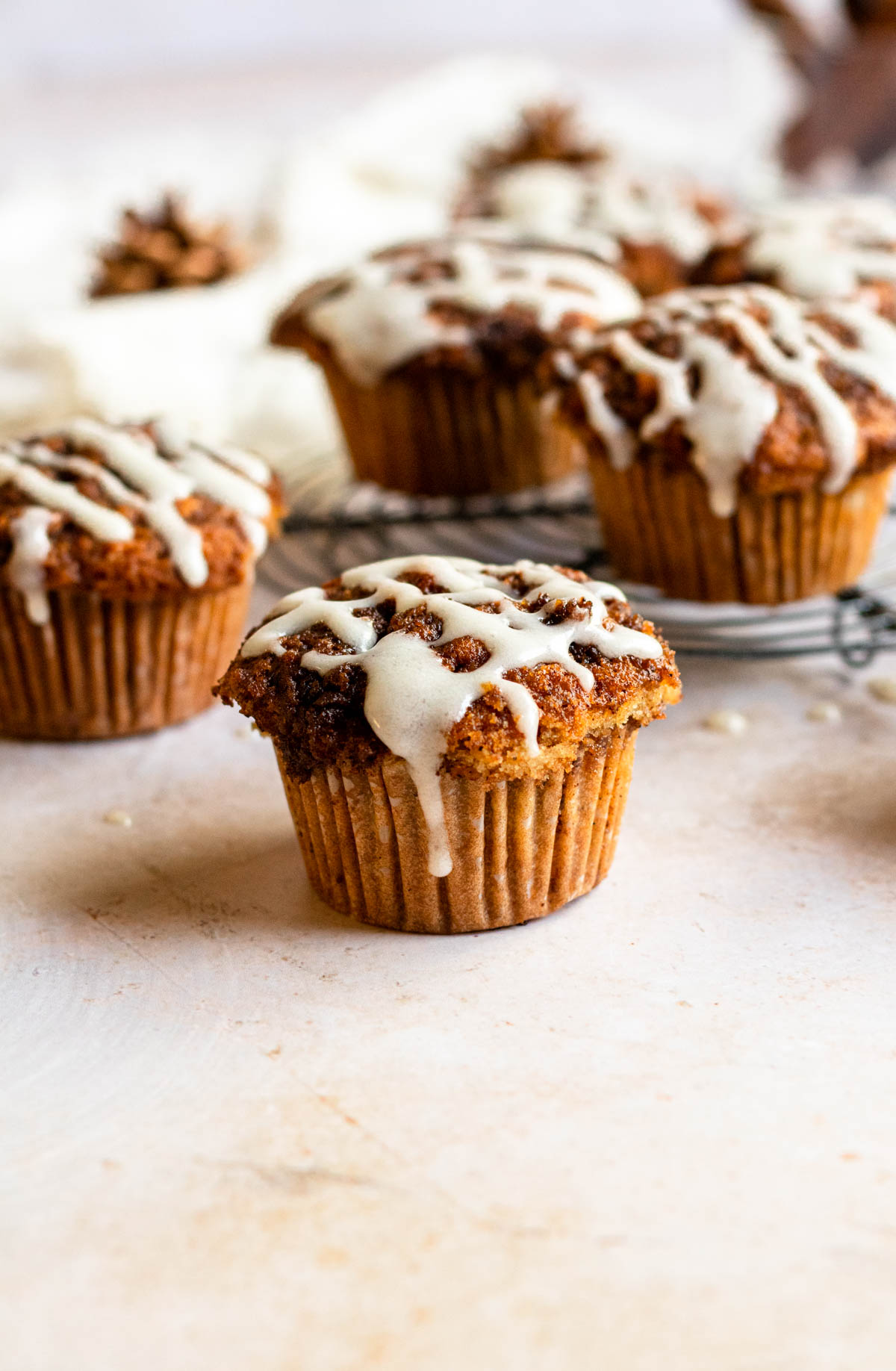Cinnamon roll muffins with cream cheese icing.