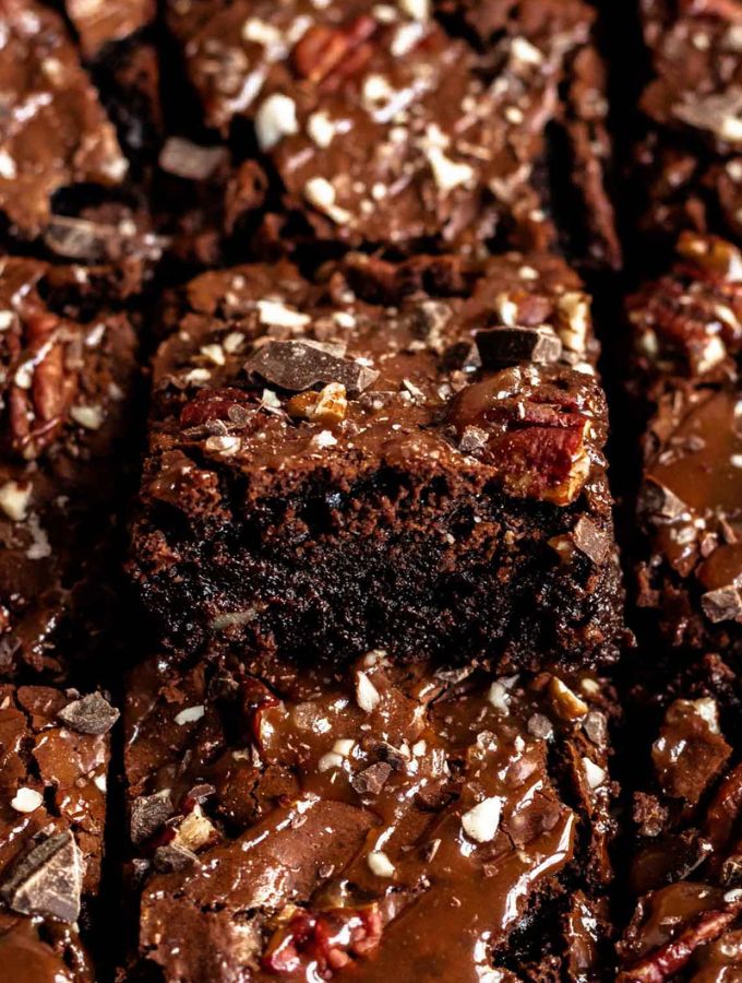 Close up shot of sliced turtle brownies.