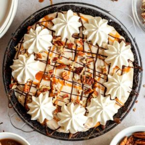 Turtle pie with whipped cream.
