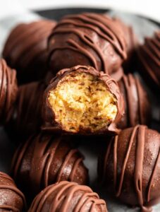 Pile of Peanut Butter Balls With-Rice krispies.