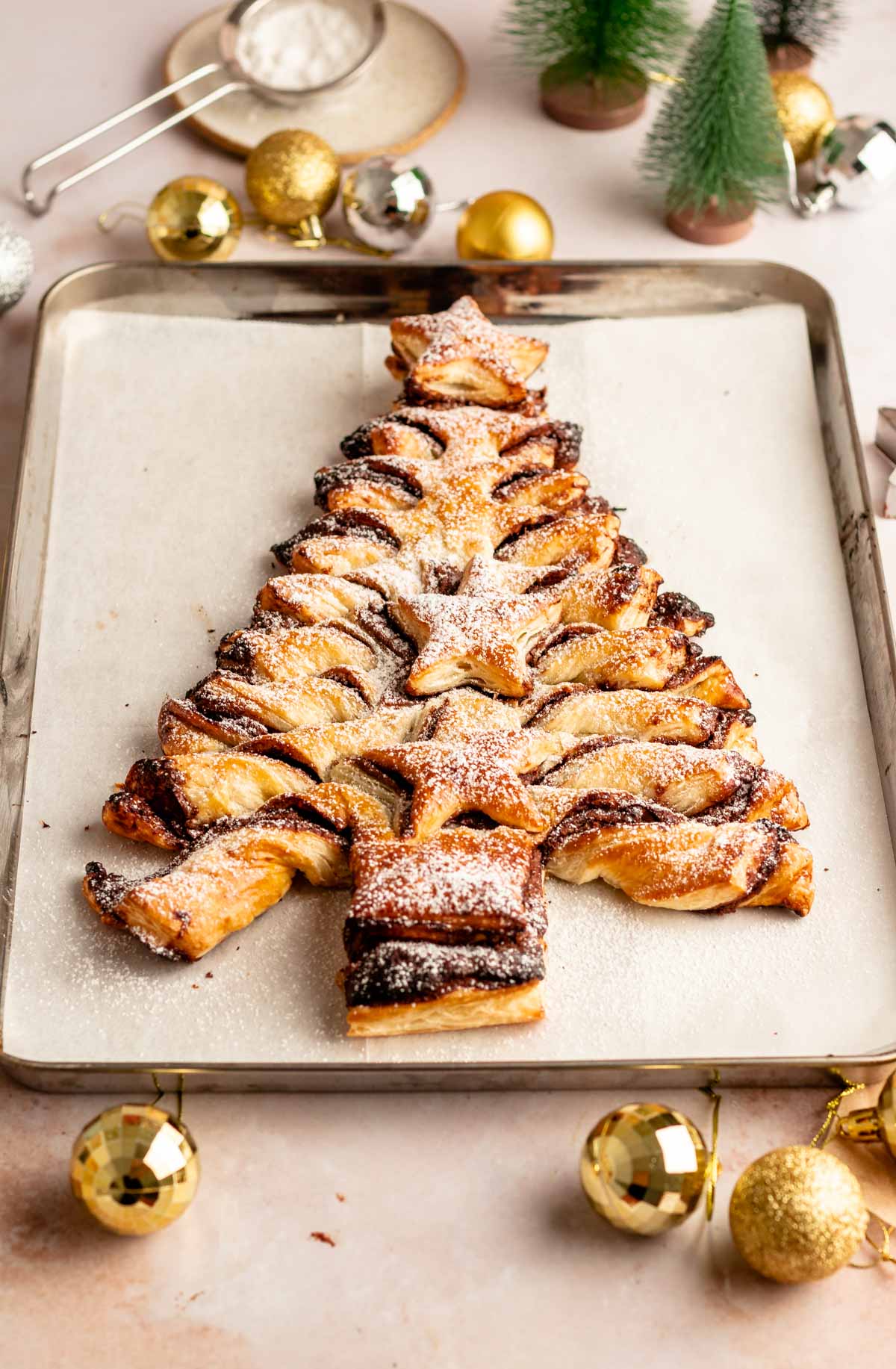 Puff pastry tree on a parchment paper.