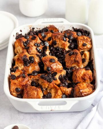 Chocolate chip bread pudding in a pan.