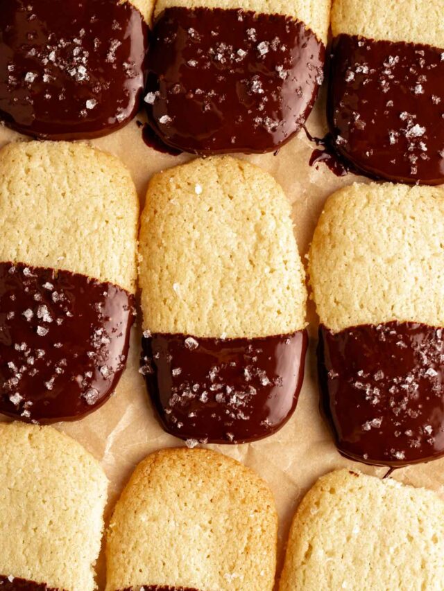 Overhead shot of chocolate dipped shortbread cookies.