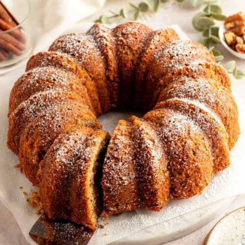 Slice of nut cake pulled out from the cake.