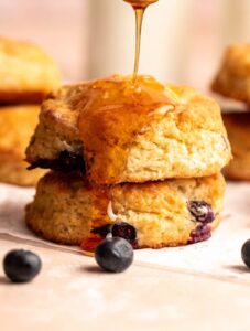 Honey drizzled on a blueberry biscuit.