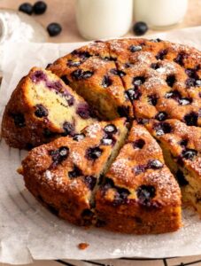 Close up shot of a sliced blueberry cake,
