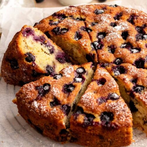 Close up shot of a sliced blueberry cake,