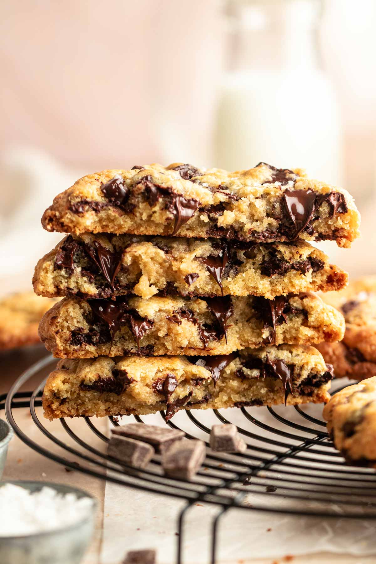 Stack of chocolate chip cookies cut in half.